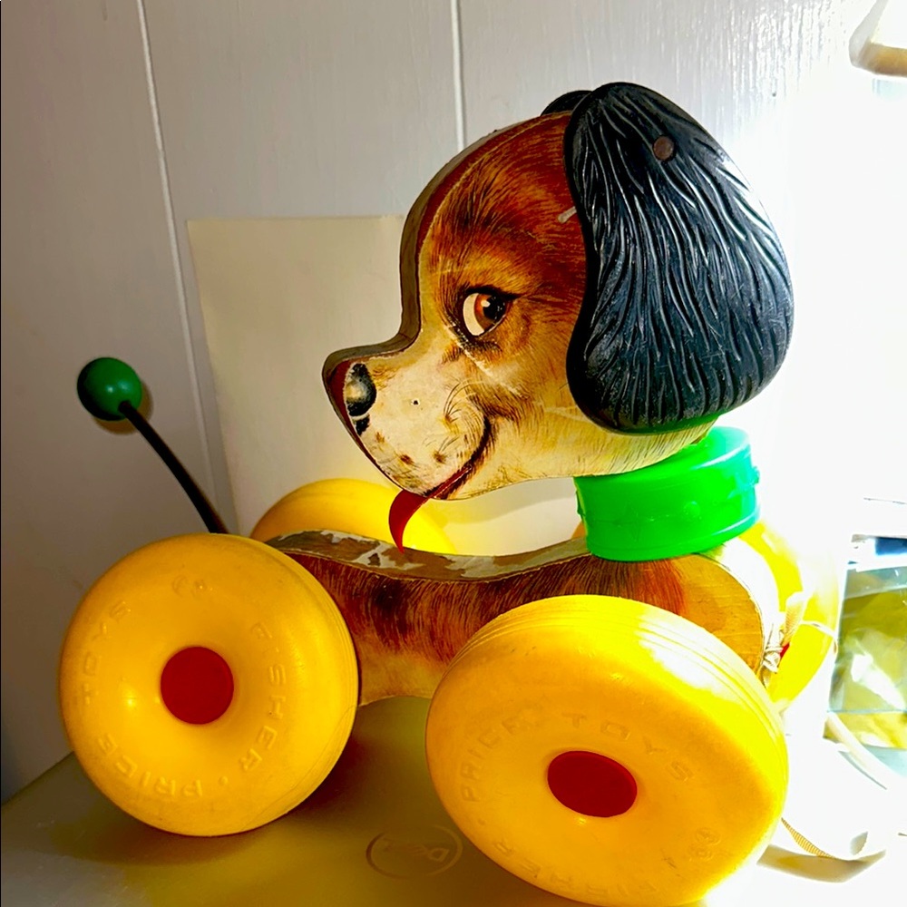 Vintage 1964 Fisher Price Classic Pull-Along Dog Toy Yellow Wheels & Green Tail.